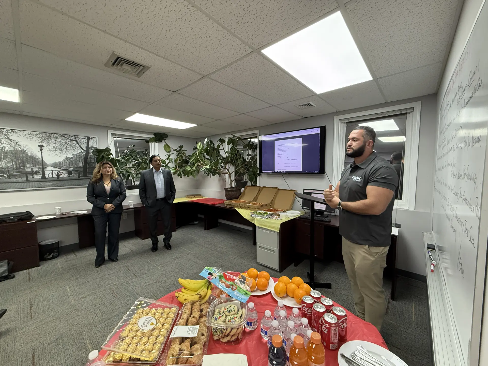 Presenter at a podium addressing a training room audience at a Got Mortgages office session
