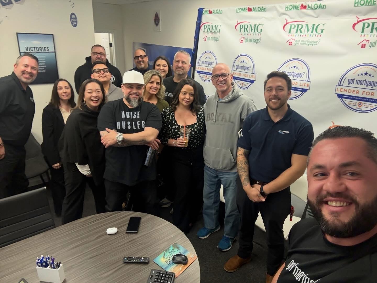 Team gathered at the got mortgages office
